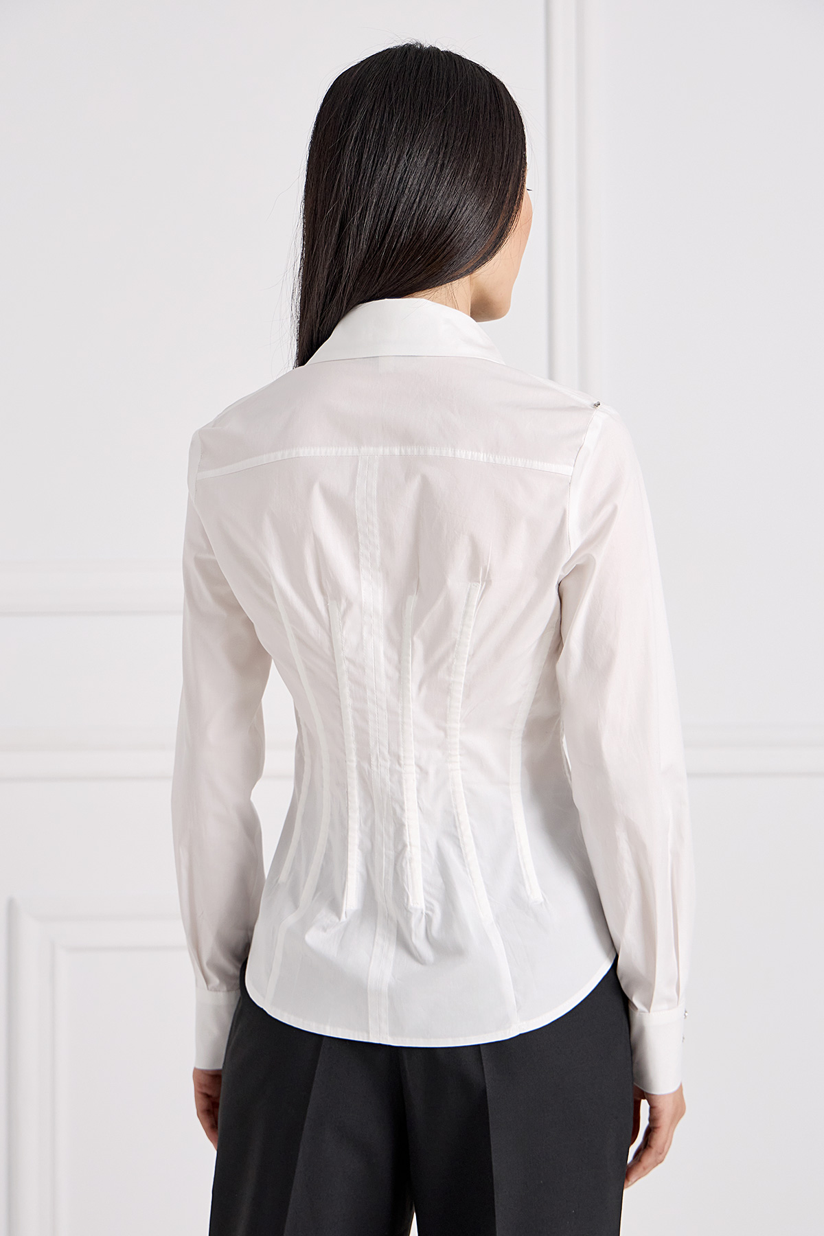 RUEDI - LOOK 2. Cotton Poplin Draped Shirt. Styled with soft leather corset  top. #ruedi #collection #collection2021 #whiteshirt #irishdesigner  #madeinireland #foreverfashion #investmentdressing