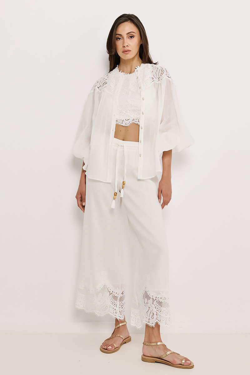 PANTS WITH ELASTIC WAISTBAND AND EMBROIDERY AT THE HEM