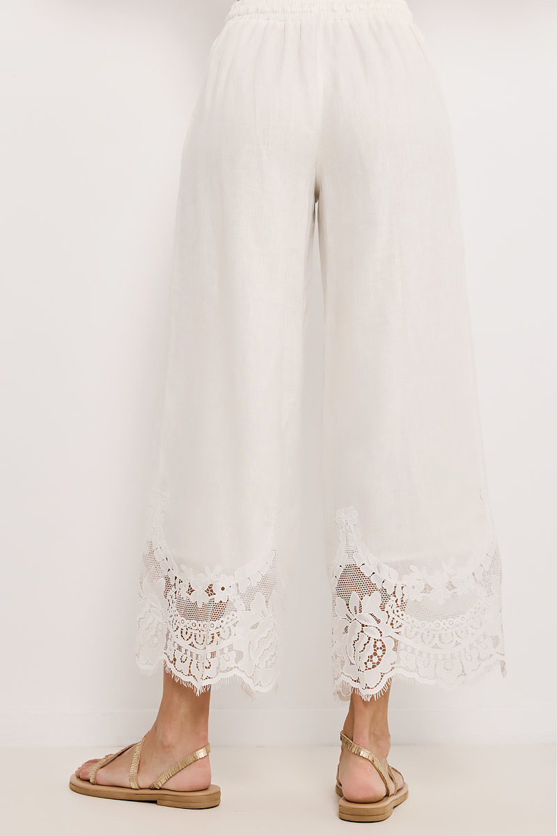 PANTS WITH ELASTIC WAISTBAND AND EMBROIDERY AT THE HEM