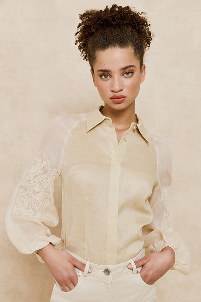 SHIRT WITH EMBROIDERY ON THE SLEEVES